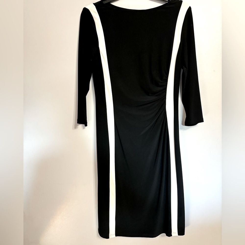 Black dress. Size 6. Very flattering. Excellent condition. Worn once